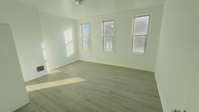 1438 Presstman St in Baltimore, MD - Foto de edificio - Building Photo