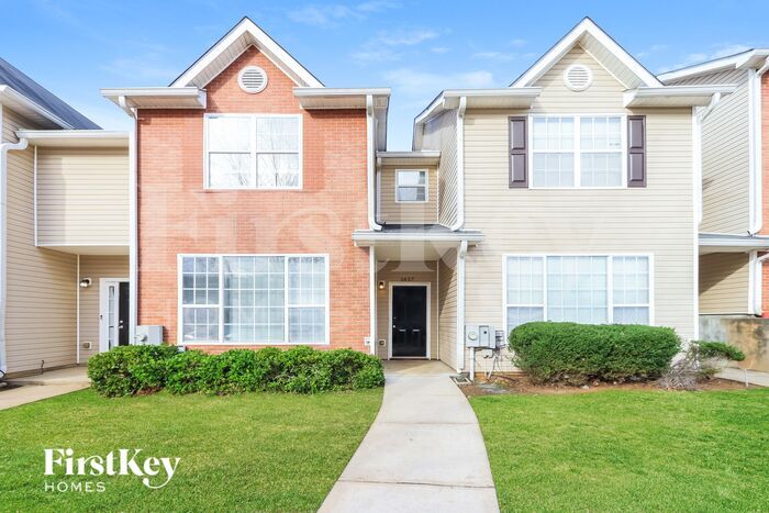 1457 Riverrock Ct in Riverdale, GA - Building Photo