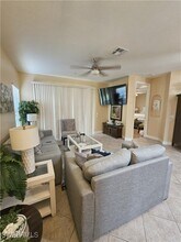 1335 Sweetwater Cove in Naples, FL - Building Photo - Building Photo