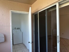 4760 NW 102nd Ave, Unit 104-12 in Doral, FL - Foto de edificio - Building Photo