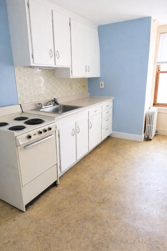 57 Broad St, Unit 5 in Claremont, NH - Foto de edificio - Building Photo