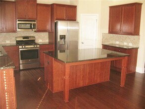 6450 Pine Bluff Dr in Cumming, GA - Building Photo - Building Photo