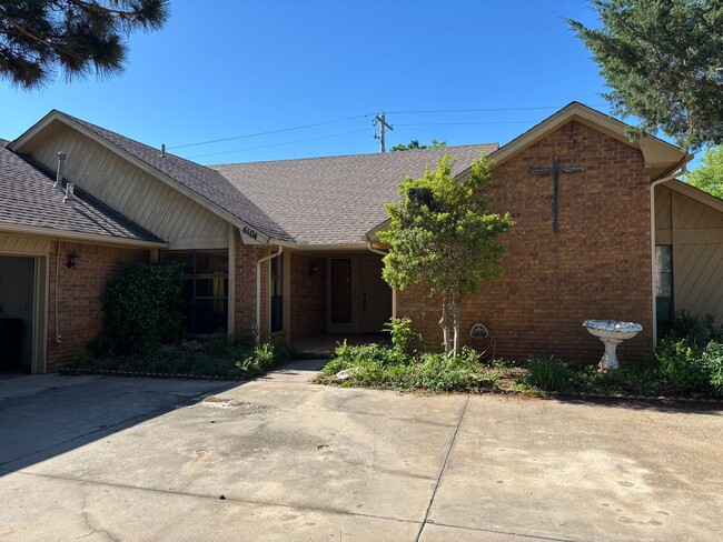 property at 6104 W Woodbrook Rd