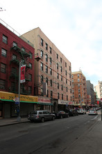 52-56 Mott St in New York, NY - Building Photo - Building Photo