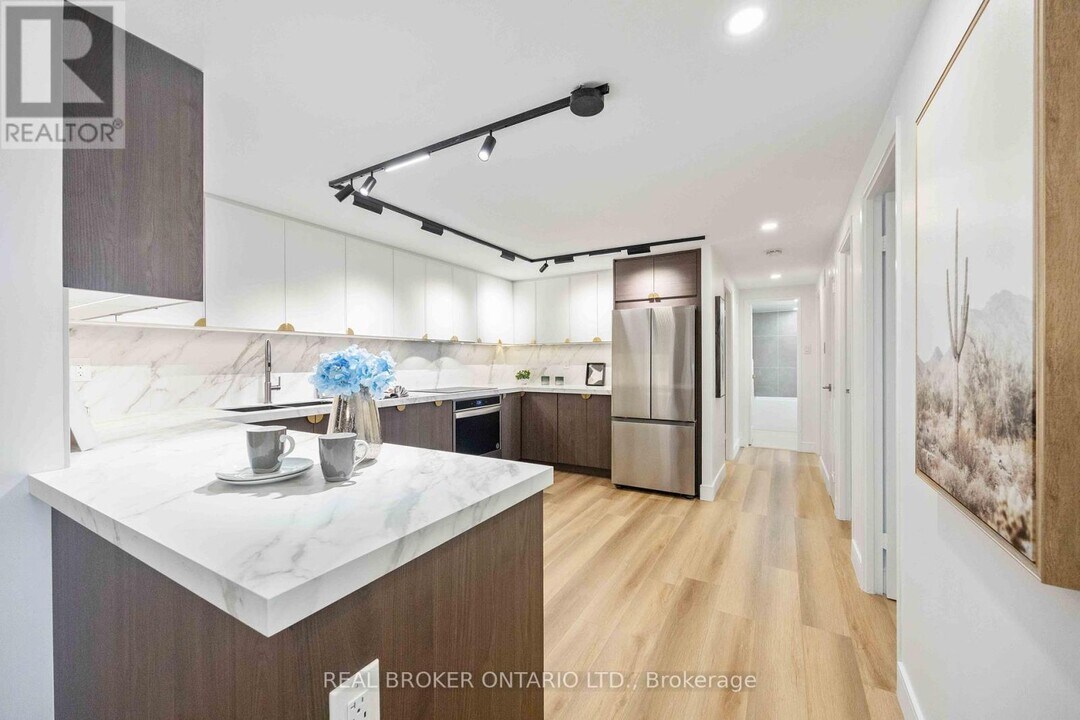 10-810 Tangreen Ct in Toronto, ON - Building Photo
