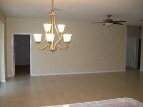 1205 Olympic Cir in Greenacres, FL - Building Photo - Building Photo