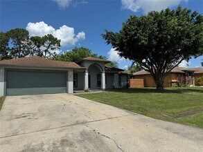 3542 SW Margela St in Port St. Lucie, FL - Building Photo - Building Photo