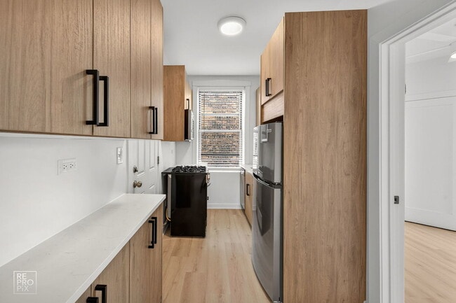6973 N Bell Ave in Chicago, IL - Building Photo - Building Photo