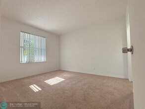 9013 NW 38th Dr in Coral Springs, FL - Building Photo - Building Photo