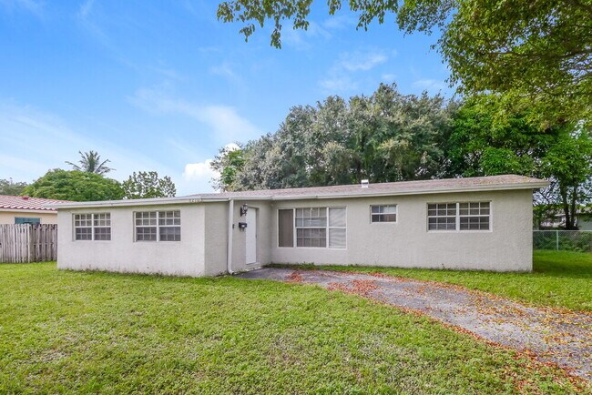 property at 6210 NW 13th St