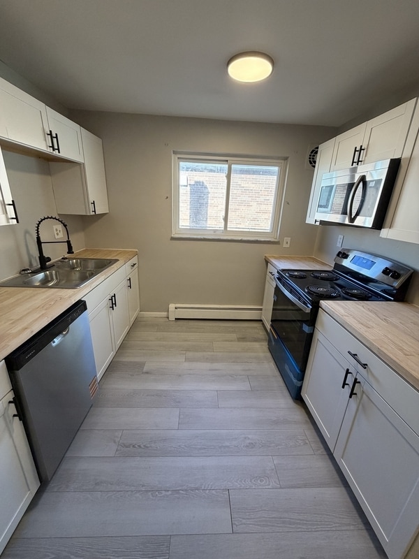 property at 6155 Ridge Ave