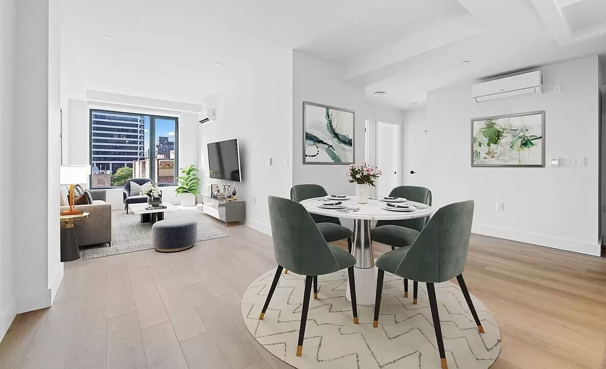 215 E 124th St, Unit 6L in New York, NY - Building Photo
