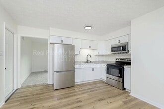 7737 Southfield Dr in Southport, IN - Building Photo - Building Photo