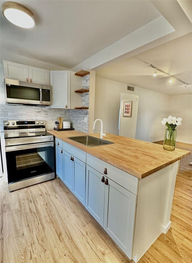 property at 715 Gardens Dr