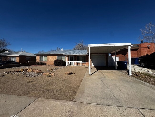 property at 9035 Los Arboles Ave NE