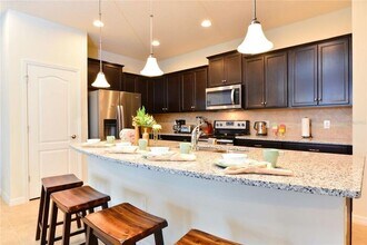 8907 Geneve Ct in Kissimmee, FL - Building Photo - Building Photo