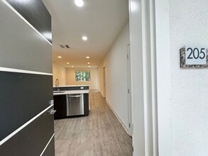 11929 Courtleigh Dr, Unit 205 in Los Angeles, CA - Building Photo - Building Photo