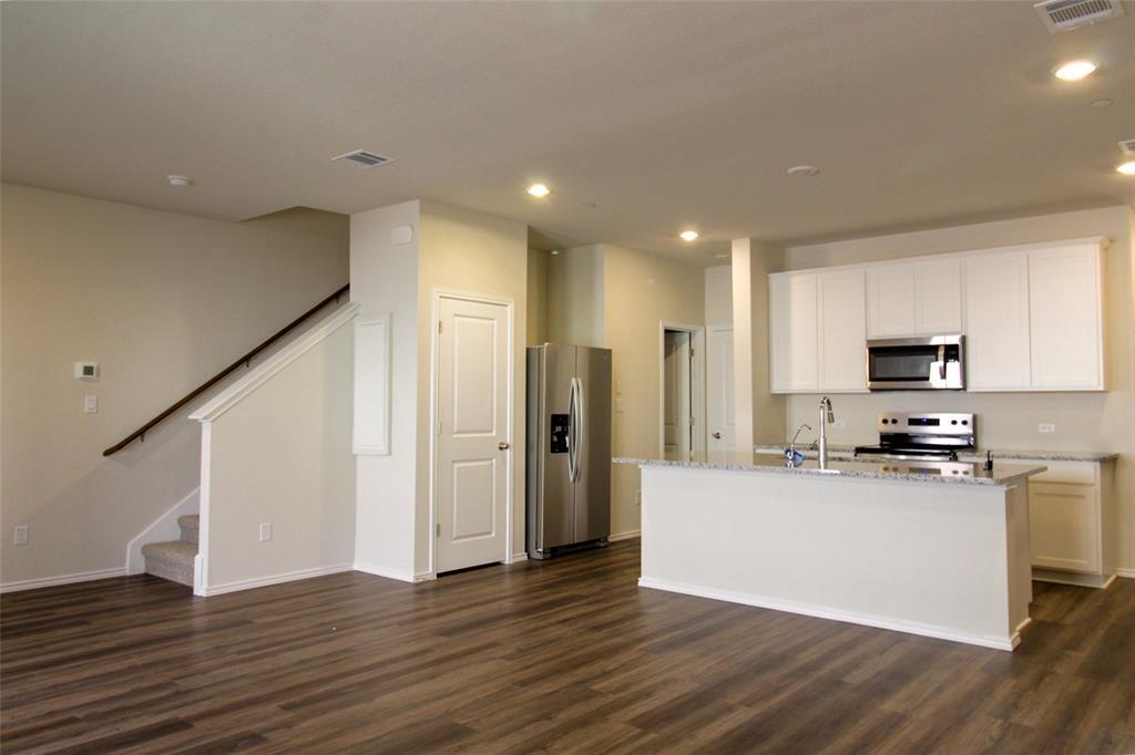 12810 Siena Vlg Ln in Mustang Ridge, TX - Building Photo