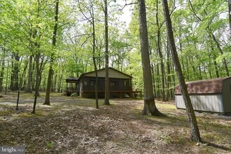 67 Tranquil Way in Great Cacapon, WV - Building Photo - Building Photo