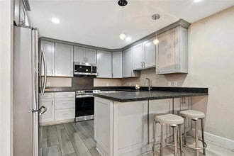 6815 Remmet Ave in Los Angeles, CA - Building Photo - Building Photo