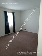 6012 Holiday Gardens Dr in Grand Blanc, MI - Building Photo - Building Photo