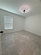 3844 Treasure Oak Wy in Ft. Myers, FL - Foto de edificio - Building Photo