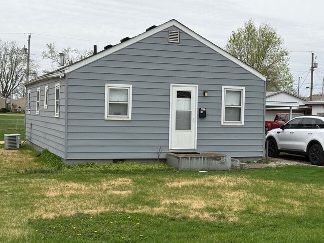 property at 106 E 3rd St