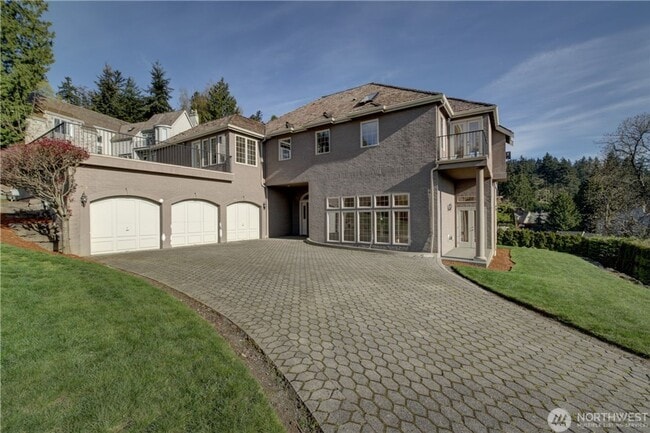 property at 8479 NE Woodland Cove Dr