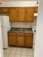 7841 Johnson St-Unit -106 in Pembroke Pines, FL - Building Photo - Building Photo