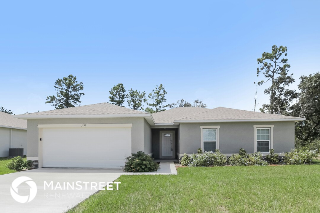 2133 Hibiscus Way in Kissimmee, FL - Building Photo