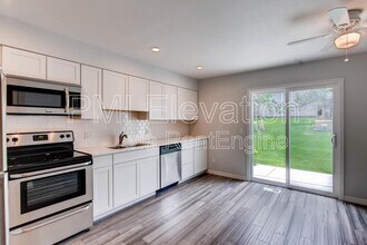 8976 W Dartmouth Pl in Lakewood, CO - Building Photo - Building Photo