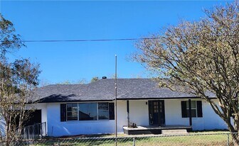12877 E State Hwy 21 in Bryan, TX - Building Photo