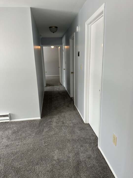 9 Pine Cluster Cir, Unit F in Manalapan, NJ - Building Photo