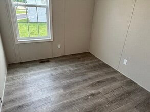 506 English Oak Ct in Whittaker, MI - Building Photo - Building Photo