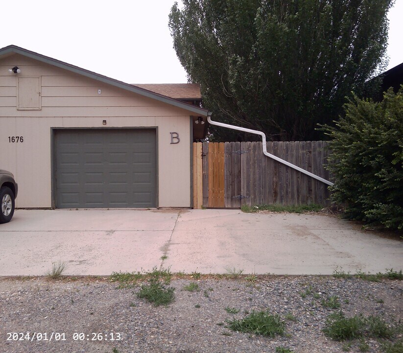 1676 Polk St, Unit B in Laramie, WY - Building Photo