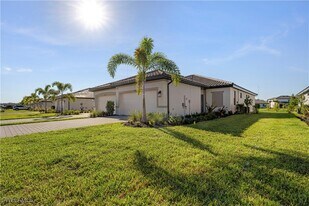19573 Hinkley Dr in Estero, FL - Building Photo