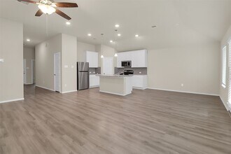 7710 Squall Ln in Mont Belvieu, TX - Building Photo - Building Photo