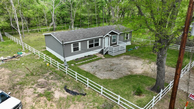 7865 Pinecone Ln in Plantersville, TX - Building Photo - Building Photo