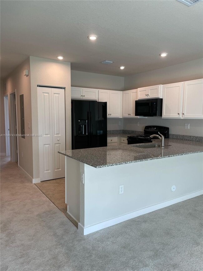 property at 584 NW 11th St