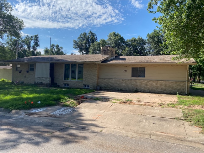 property at 327 W 3rd Ave
