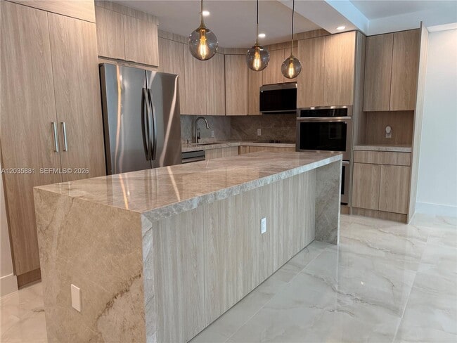 property at 19390 Collins Ave