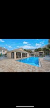 1018 Woodshire Ln, Unit A208 in Naples, FL - Building Photo - Building Photo
