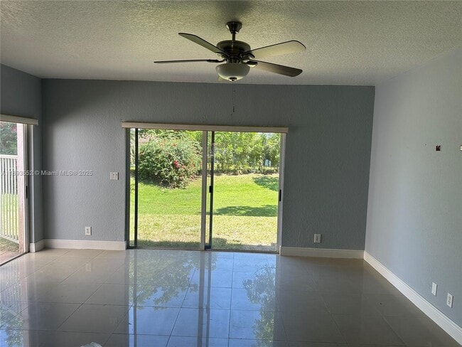 7653 Tamarac Island Cir in Tamarac, FL - Building Photo - Building Photo