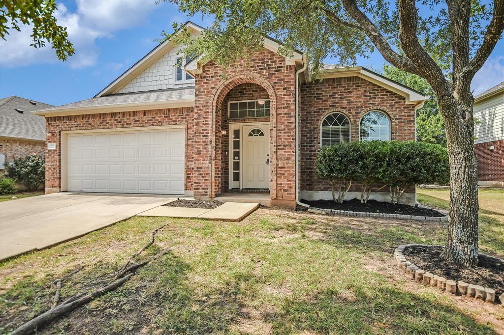 207 Hoot Owl Ln N in Leander, TX - Foto de edificio