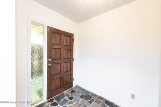 5855 Whispering Ln in Titusville, FL - Building Photo - Building Photo