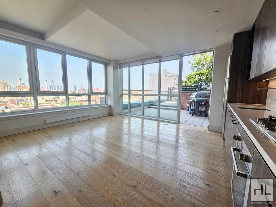 Modern 1-Bedroom with Private Balcony | Ea in New York, NY - Building Photo