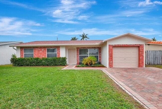 property at 11431 NW 37th St