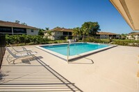 151 Cypress Way E, Unit A107 in Naples, FL - Building Photo - Building Photo