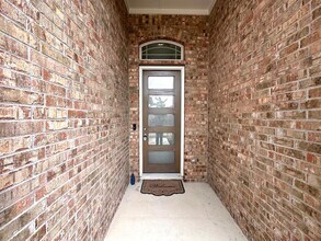 295 Oleander Loop in Mustang Ridge, TX - Building Photo - Building Photo