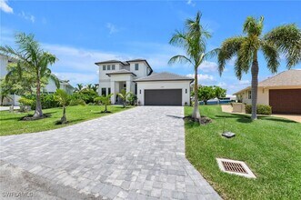 1083 Old Marco Ln in Marco Island, FL - Building Photo - Building Photo